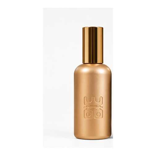 WOO Home & Body Mist goud op witte achtergrond