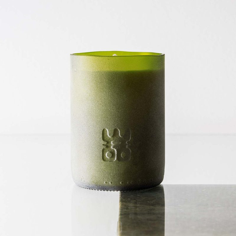 WOO lucky candle matt green extra large on table